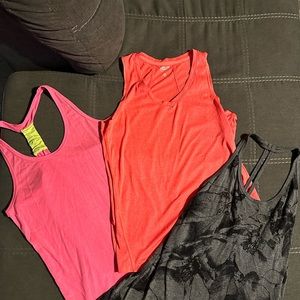 Three athletic tanks